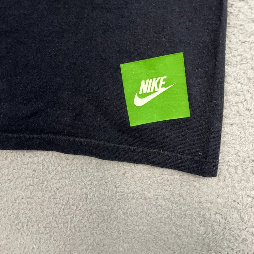 VTG Nike T Shirt Youth Size L Black Center Swoosh World Famous 2-Side Tee *Rare*
